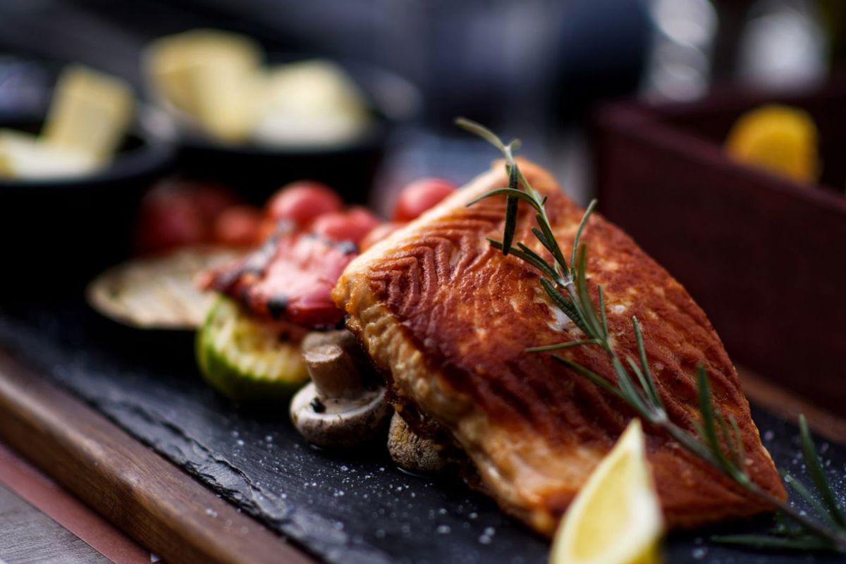 A steak with some vegetables